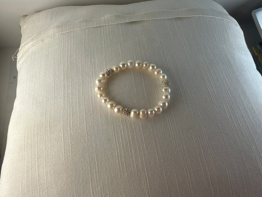 White pearl stretch bracelet with rhinestone pave spacer beads